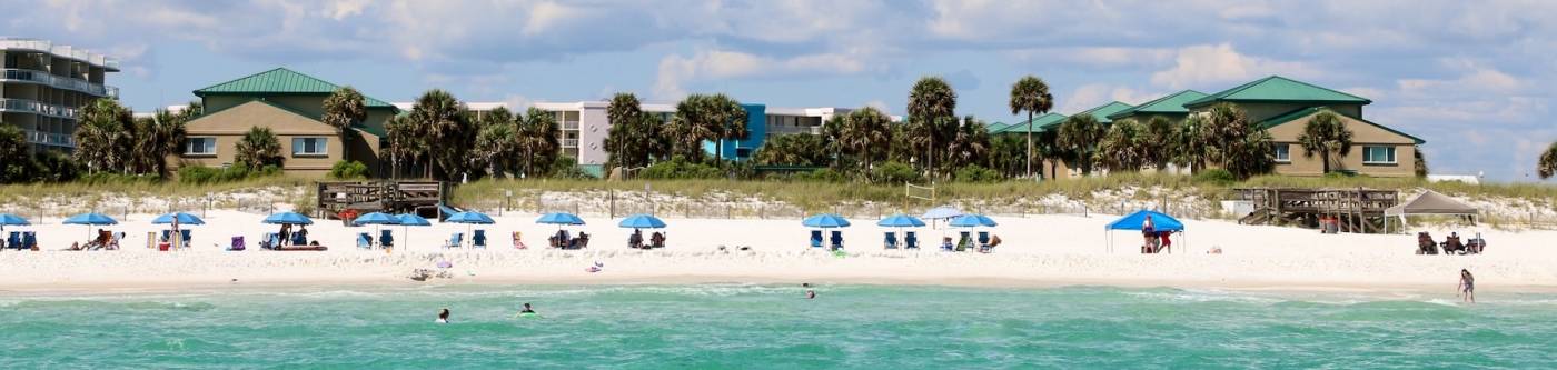 aerial view from beach looking toward Seaspray Beach Vacation Rentals property 