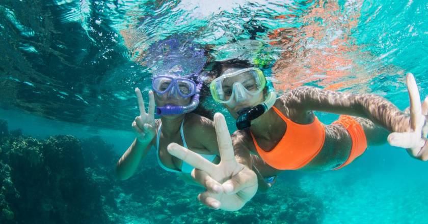 two woman snorkeling